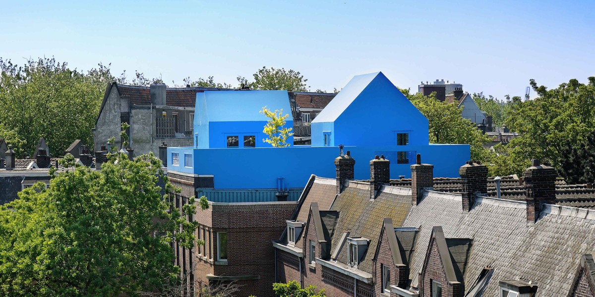 Wie eine Tiny-House-Siedlung auf dem Dach aussehen kann, zeigt das Didden Village in Rotterdam auf besonders kunstvolle Weise. Foto: MVRDV